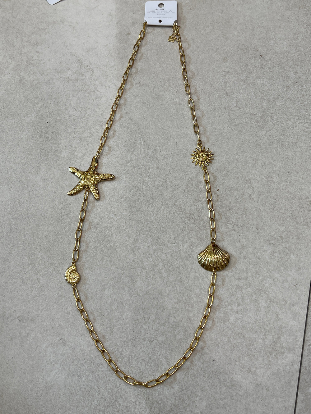Collier chaîne étoile coquillage soleil or