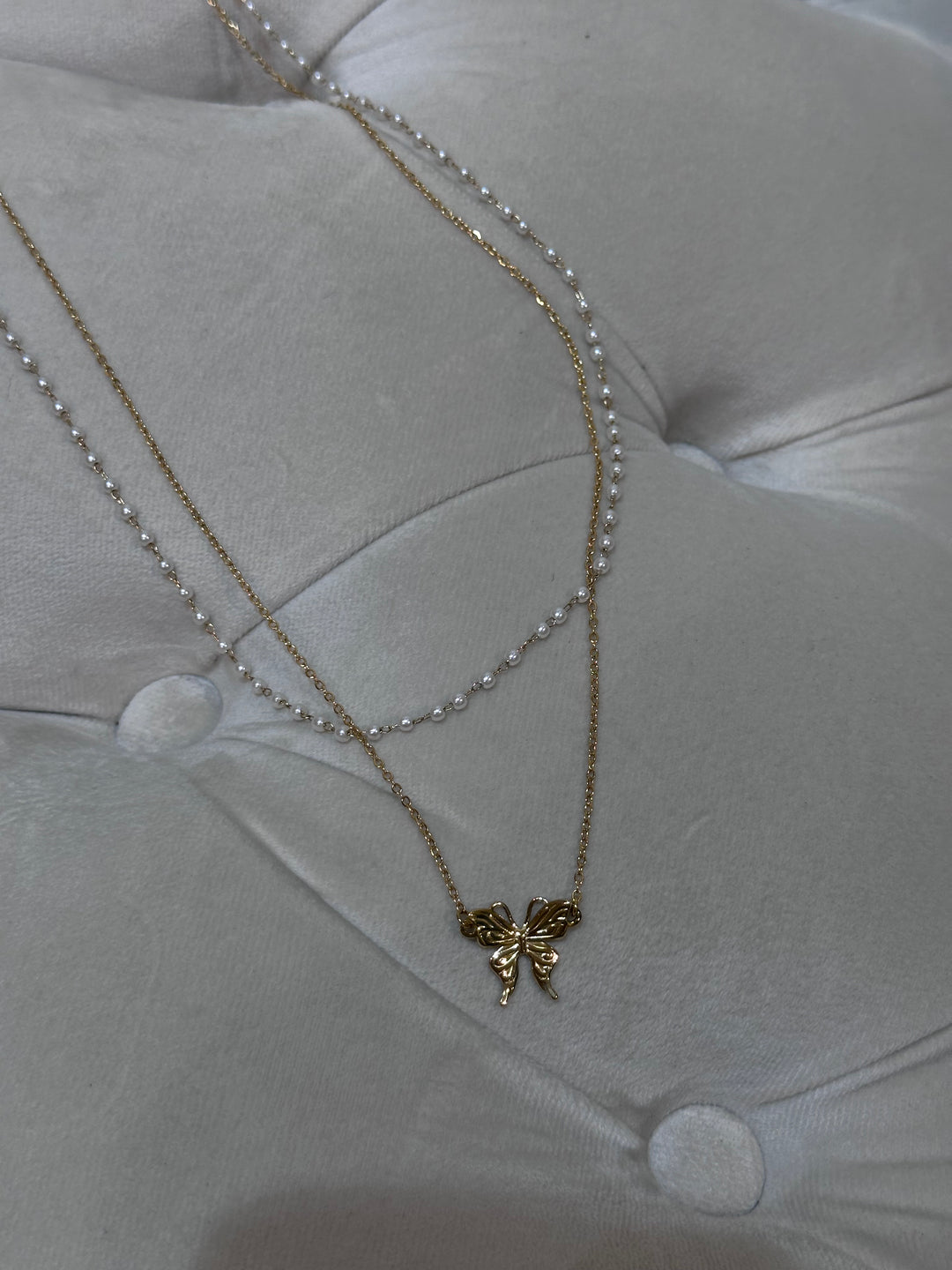 Chaîne à la taille perles/papillon