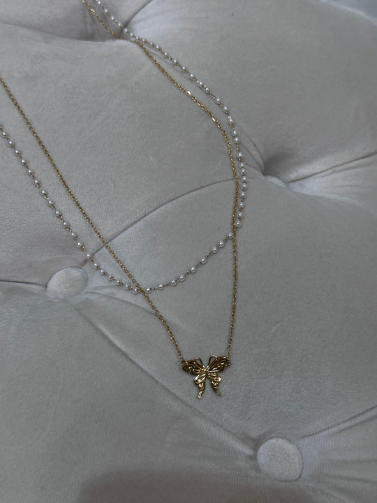 Chaîne à la taille perles/papillon