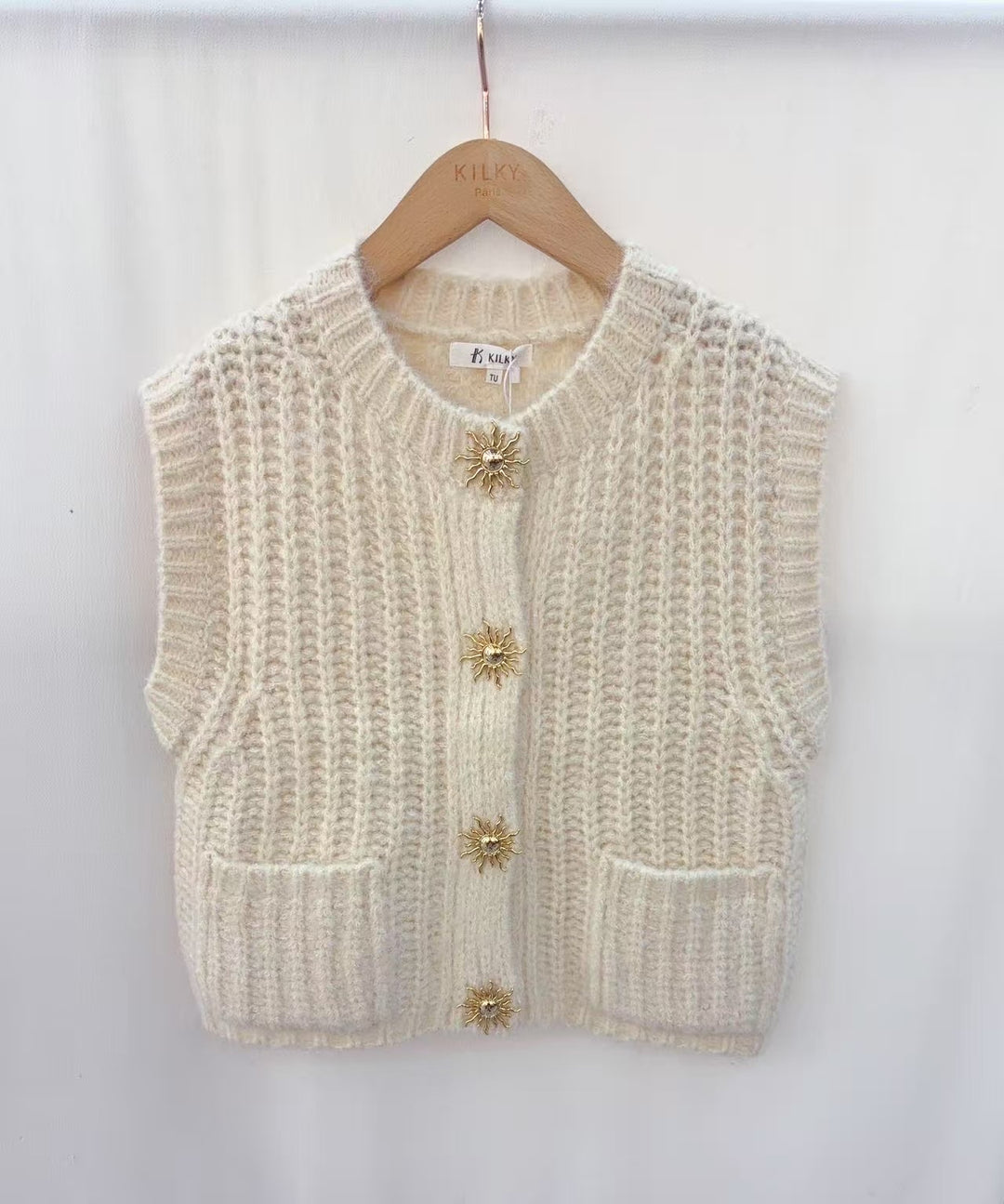 Gilet sans manches poches et boutons soleil 1771