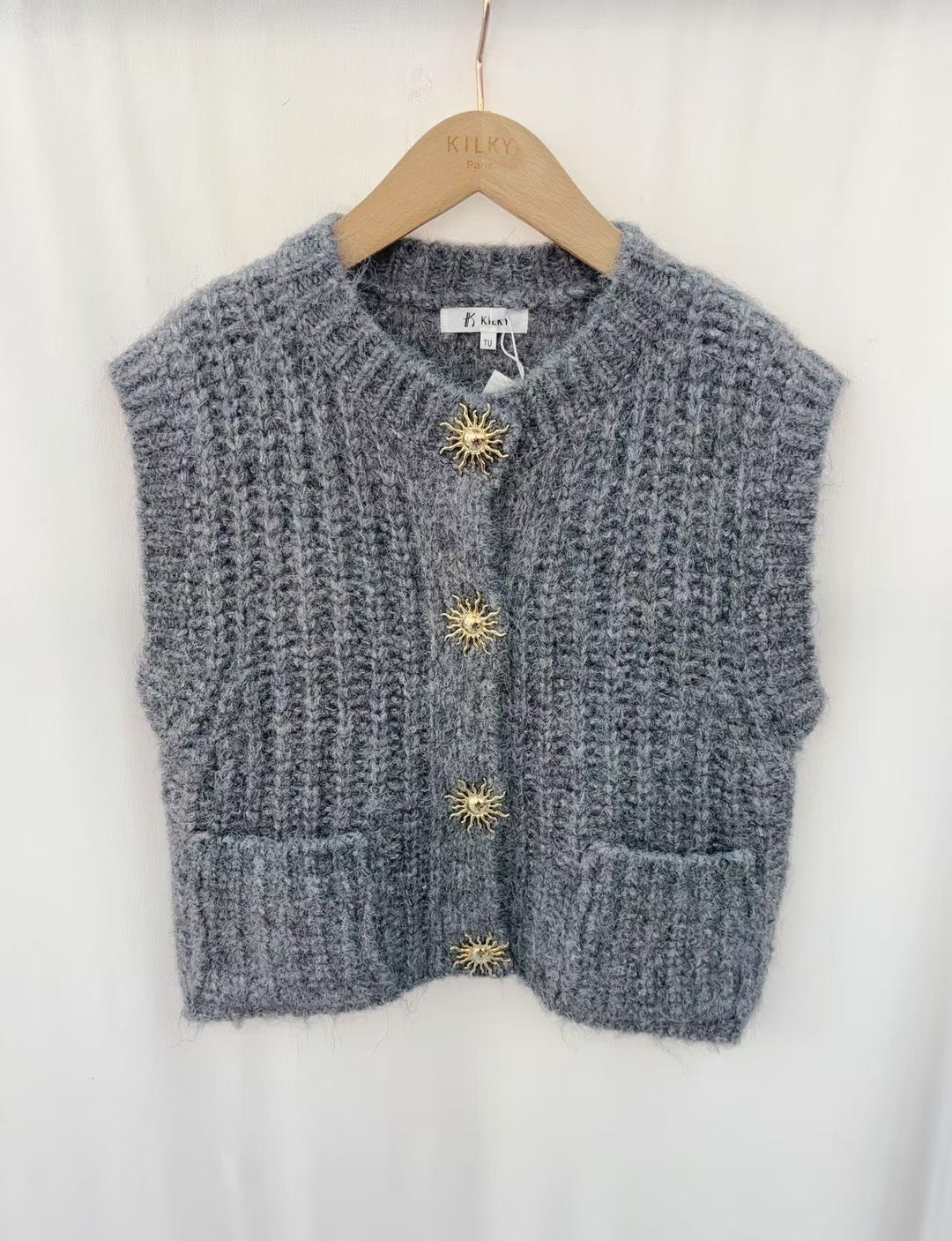 Gilet sans manches poches et boutons soleil 1771