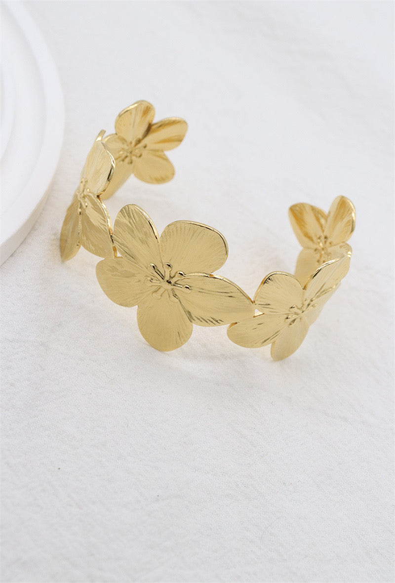 Bracelet manchette fleuri acier