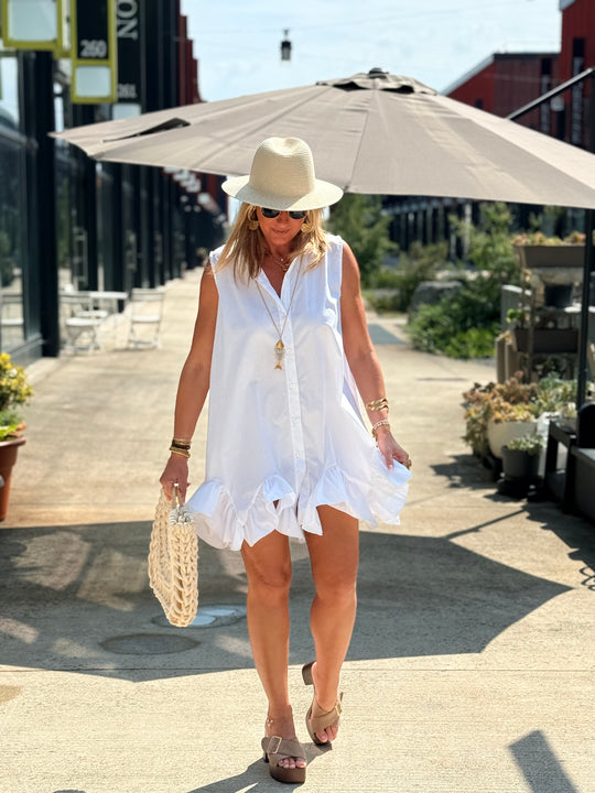 Robe blanc volant en bas