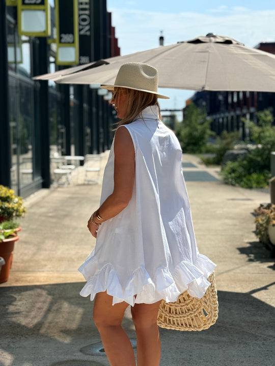 Robe blanc volant en bas