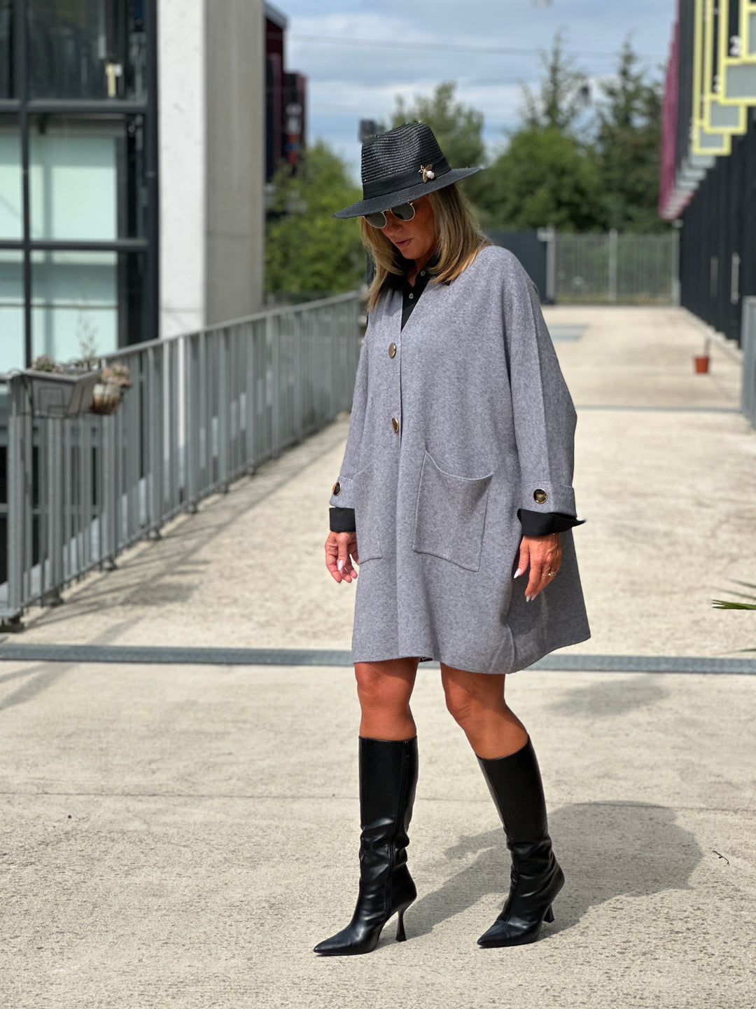 Gilet long boutons et poches 1541