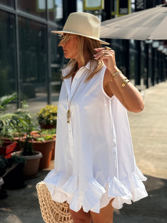 Robe blanc volant en bas