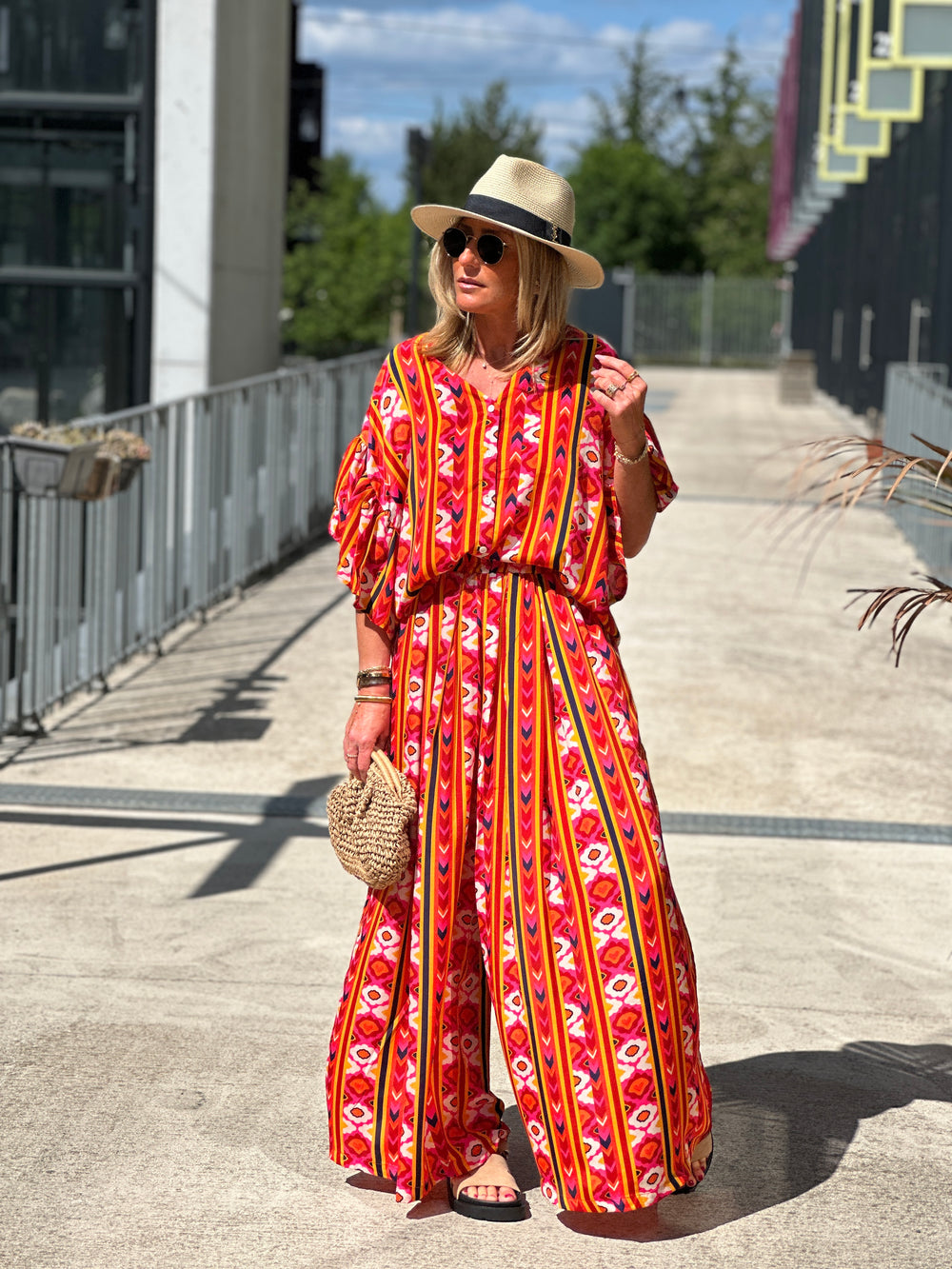Ensemble blouse pantalon orange motifs