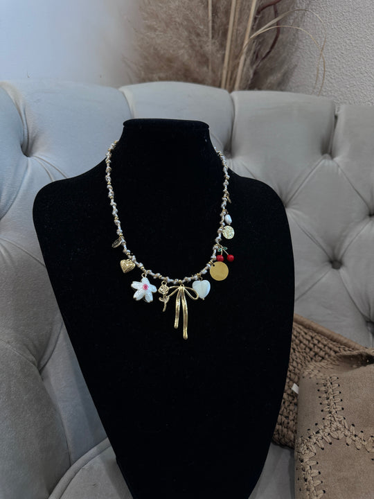 Collier doré noeud fleur
