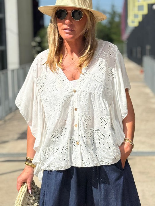 Blouse broderie anglaise col plongeant