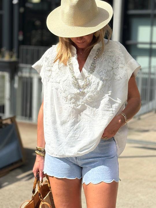 Top blanc col V strass