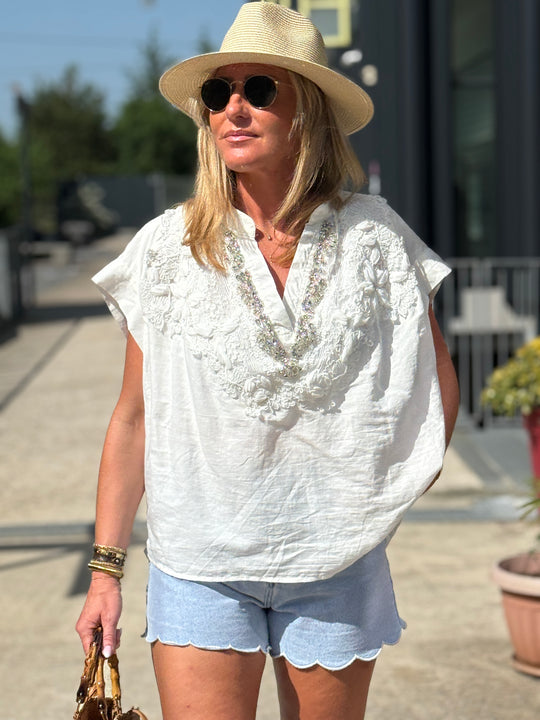 Top blanc col V strass