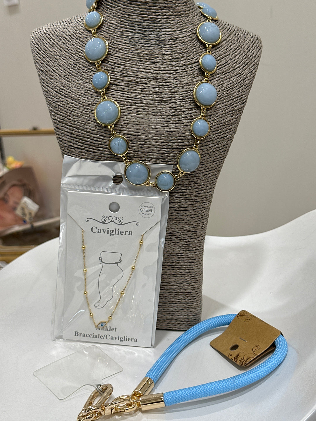 Set collier nacré + bijou pied œil + bracelet téléphone
