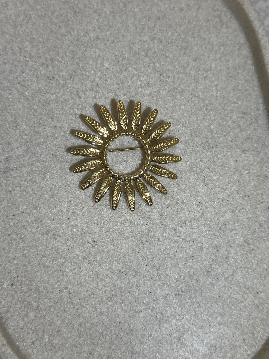 Broche soleil