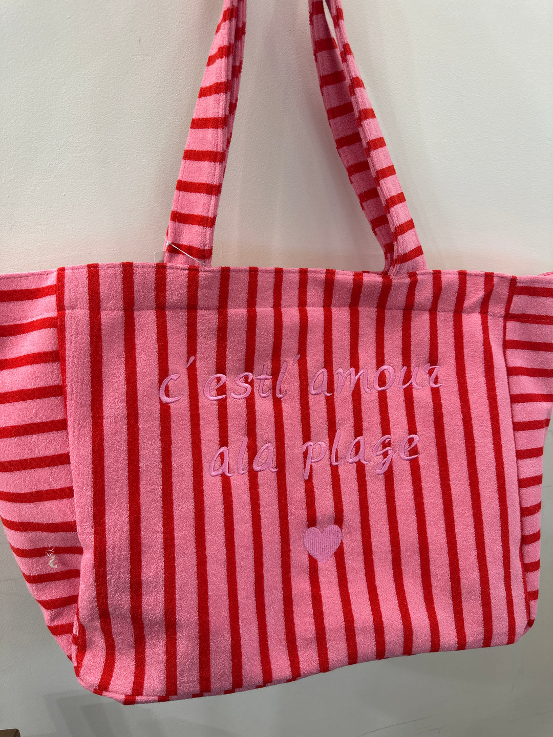 Sac rose à rayures rouges