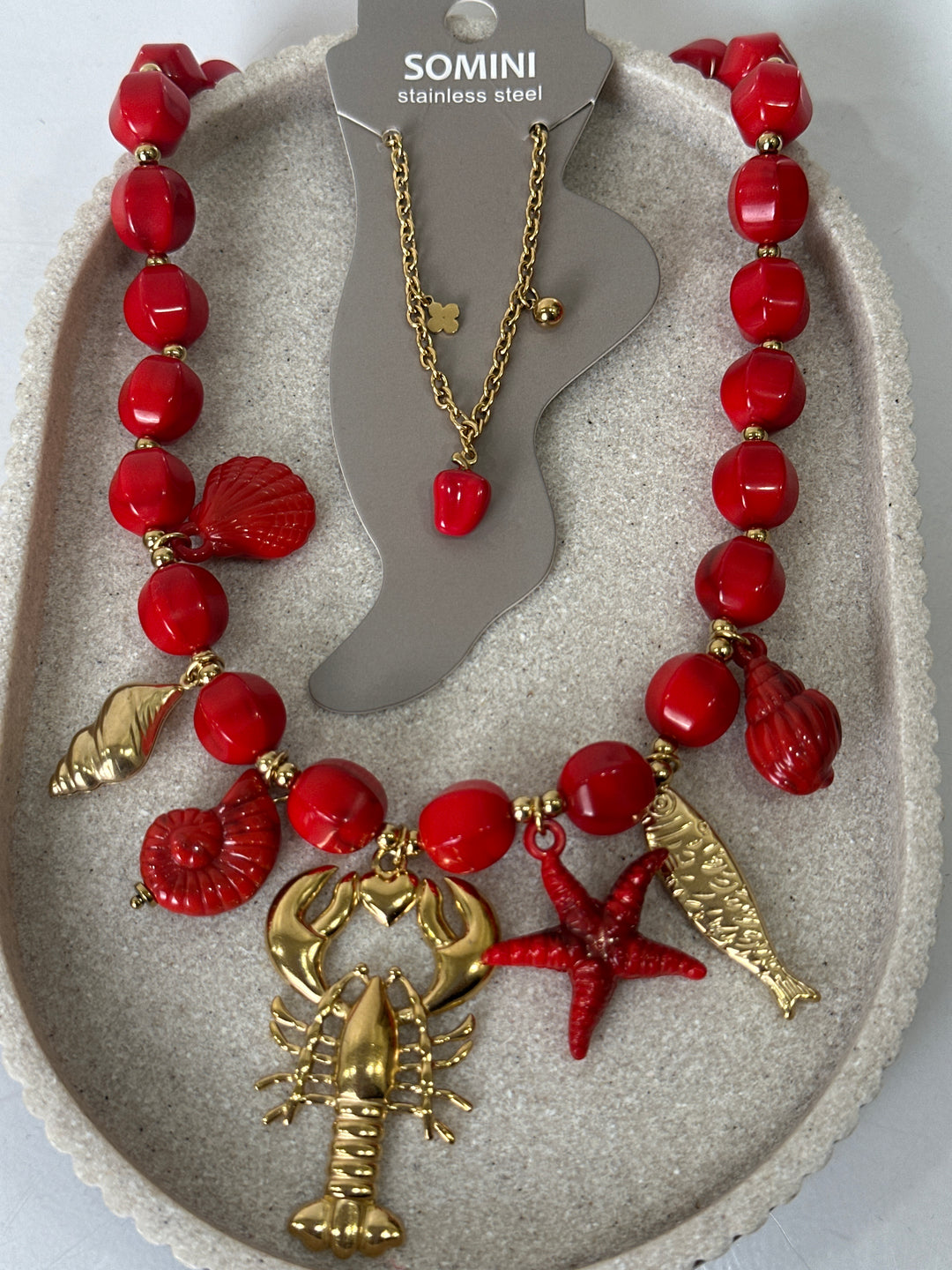 Set collier perles rouge + bijoux pied