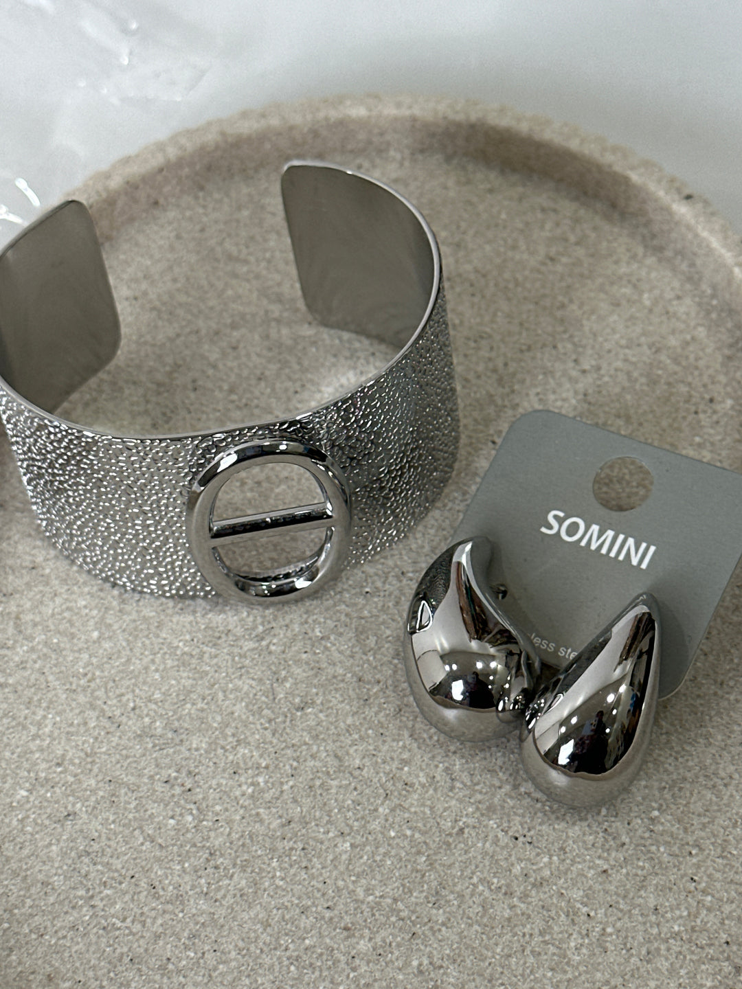 Set boucles d’oreilles + manchette argenté