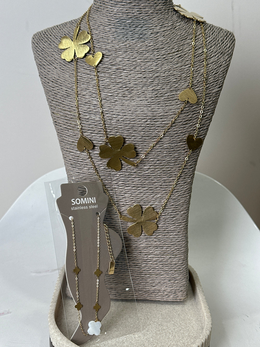 Set sautoir et bijoux pied trèfles