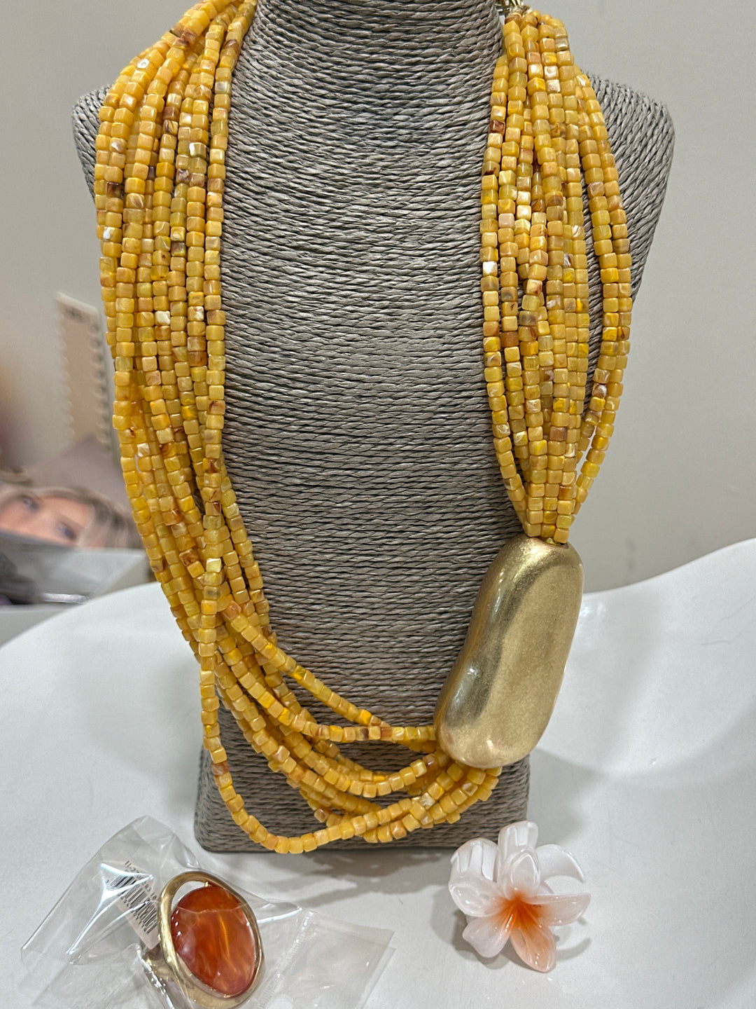 Set bague orange + collier multi rangs + mini pince fleur
