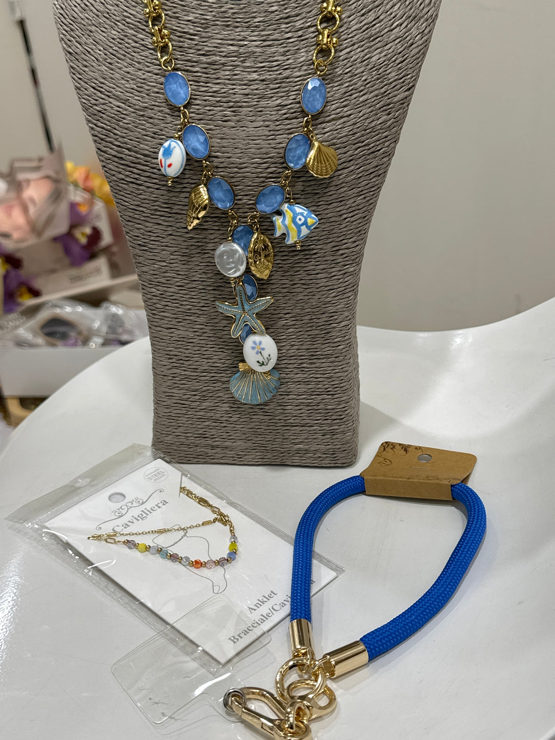 Set collier pendentifs bleu + bijou pied + bracelet téléphone