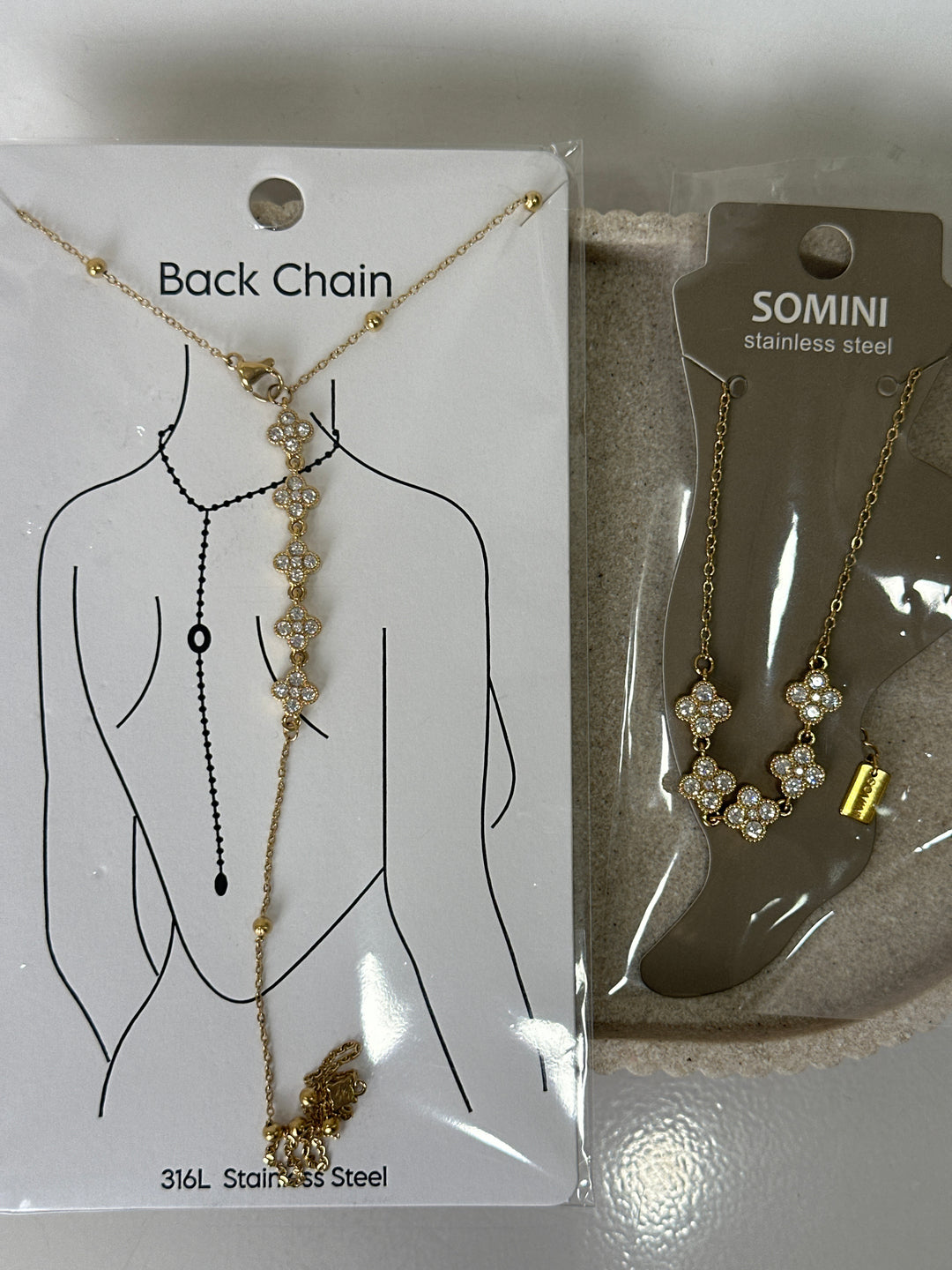 Set bijoux dos et pieds trèfle strass