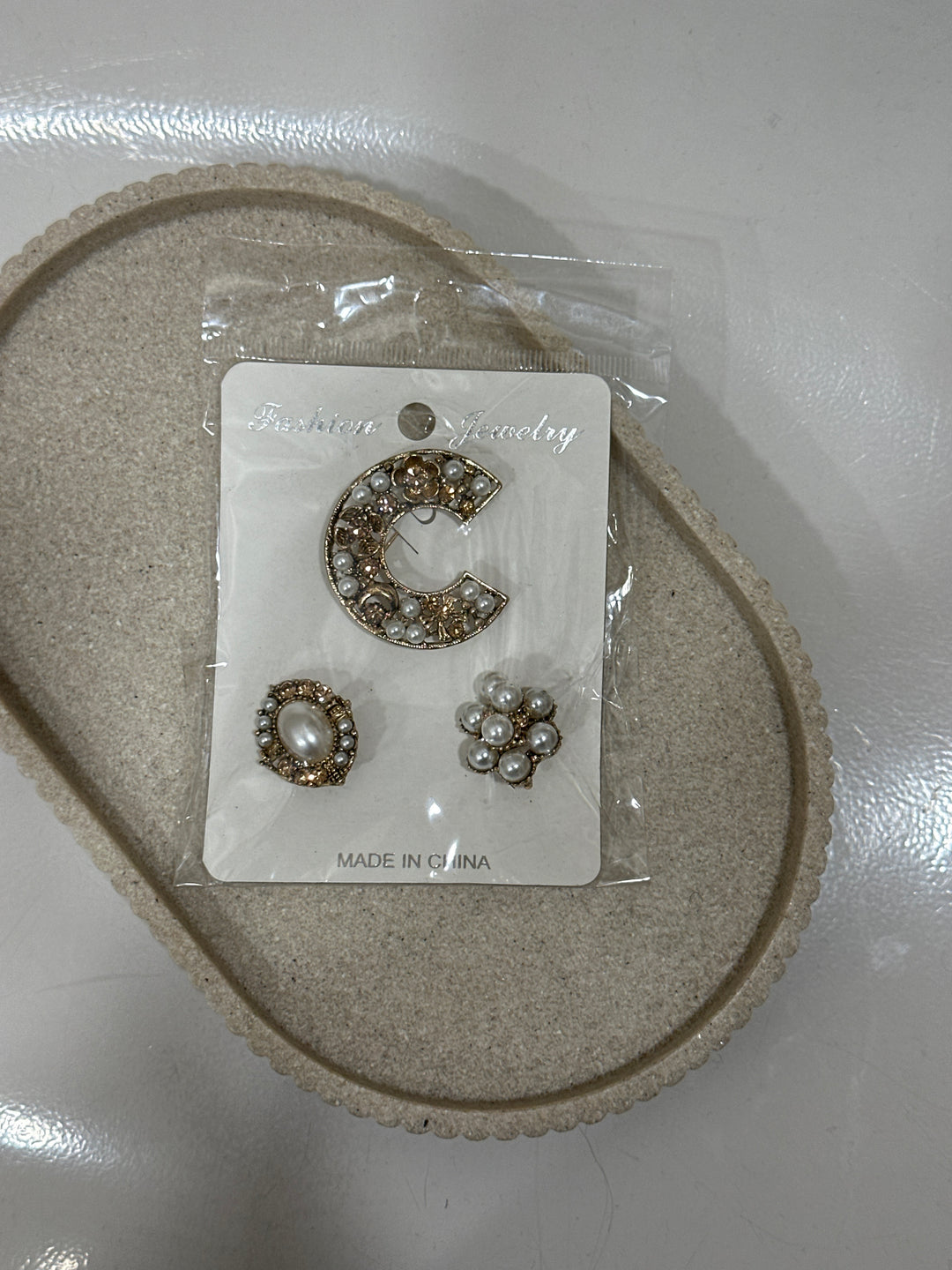 Broche N76