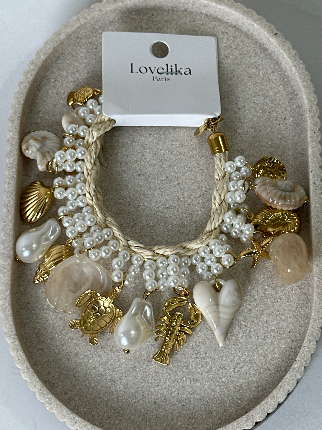 Bracelet multi pendentifs beige blanc