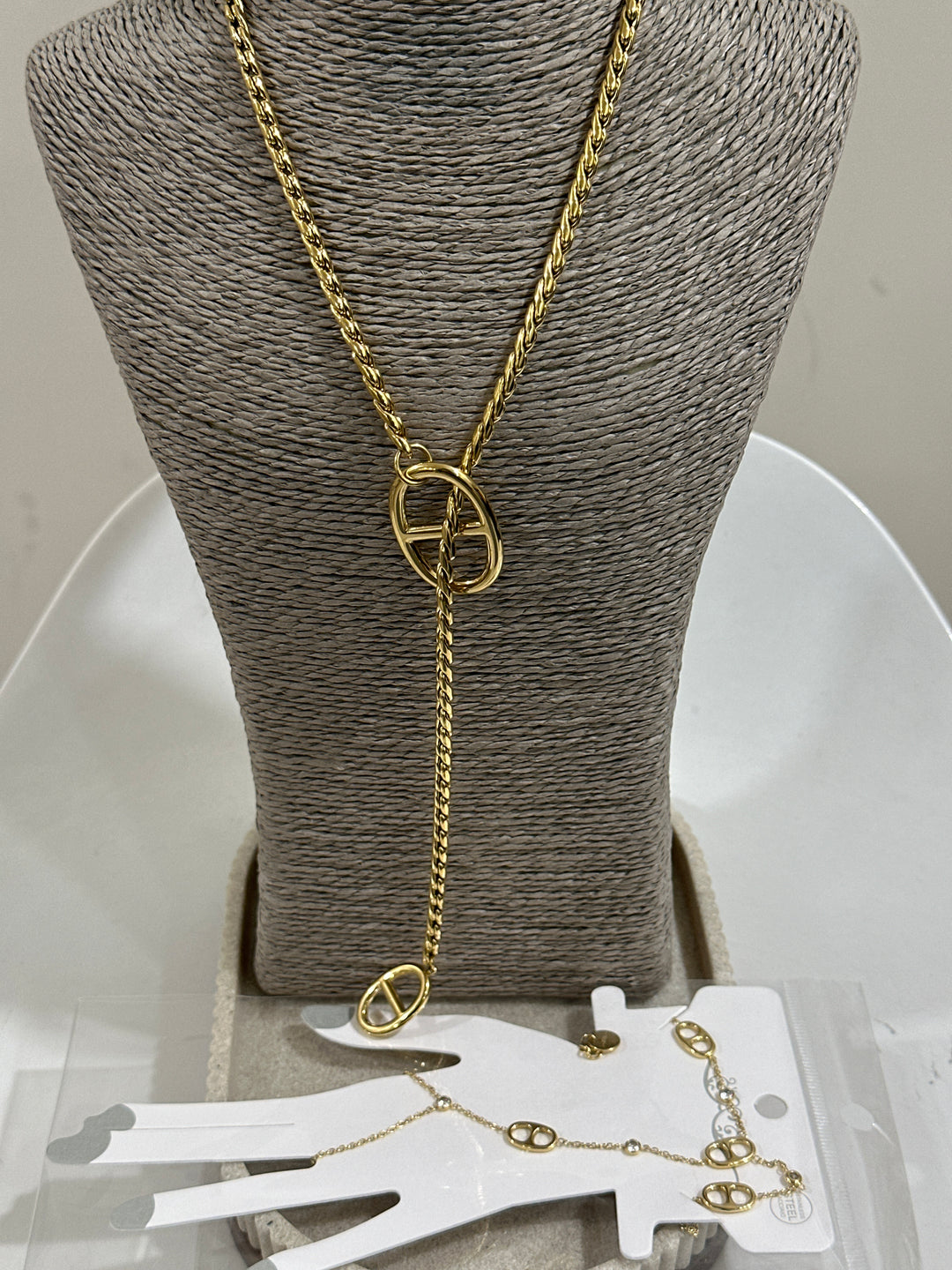 Set sautoir + bijoux main même motif