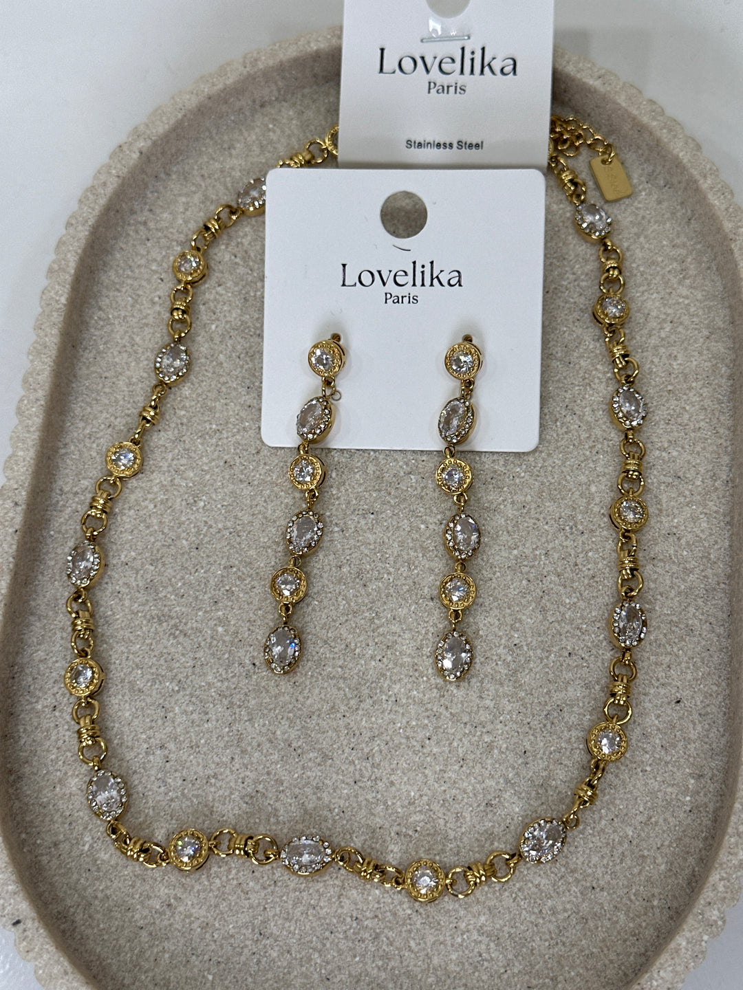 Set collier strass or + boucles d’oreilles strass or