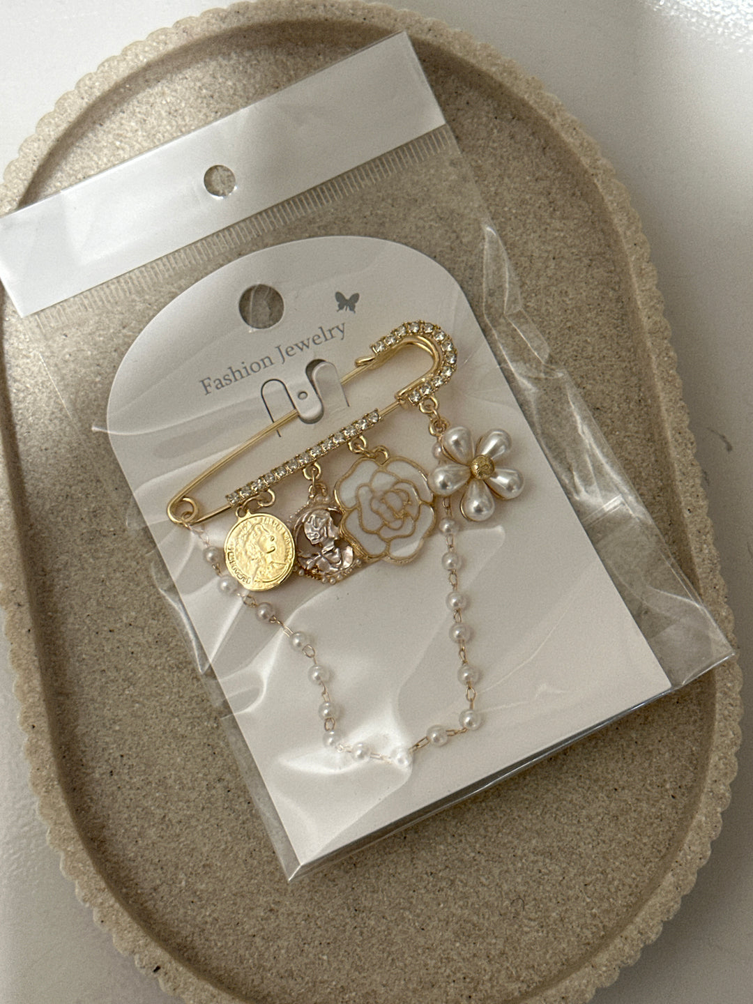 Broche N72