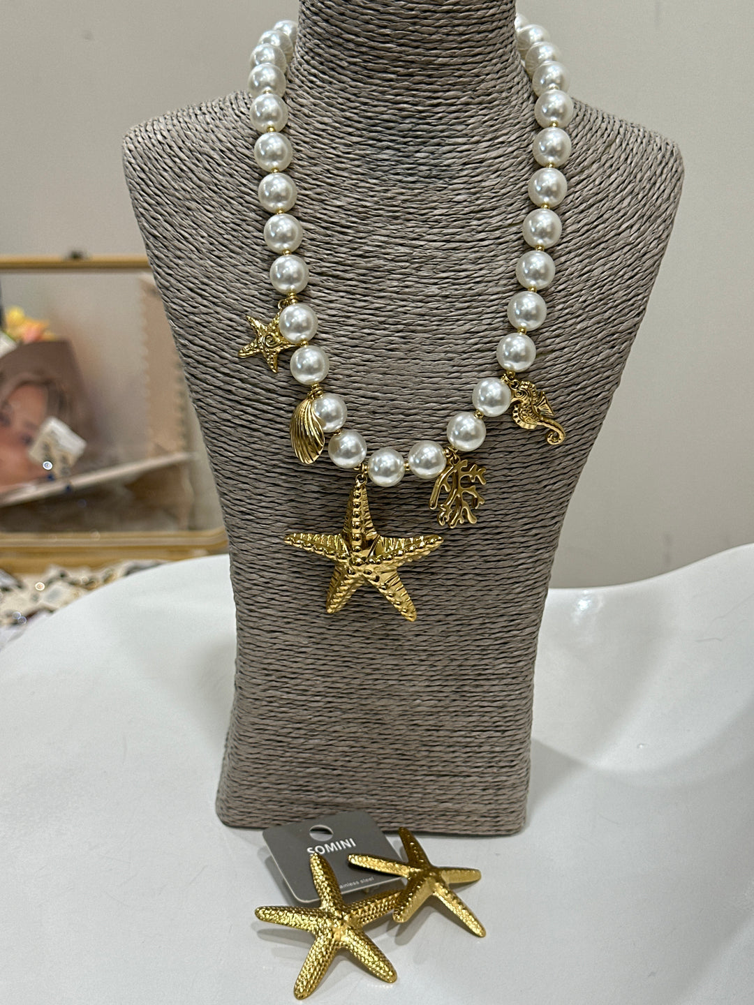 Set collier perle blanche + boucles étoiles de mer